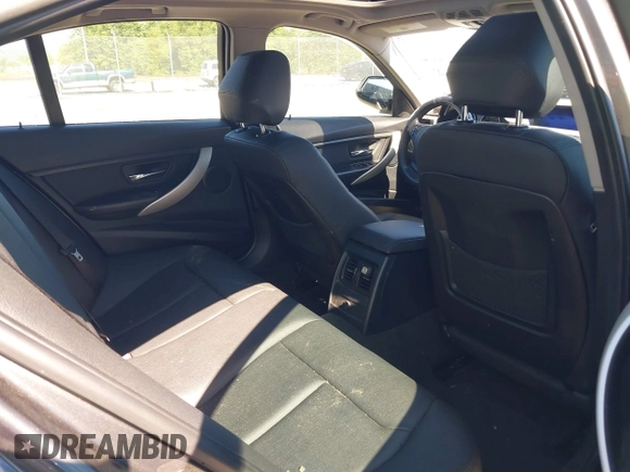 2014 BMW 3 Series 320i xDrive with VIN WBA3C3C54EP661409, listed as a IAAI auction lot 42182593 with 159,104 mi miles and . Bid and sale history available at DreamBid. Image 8.