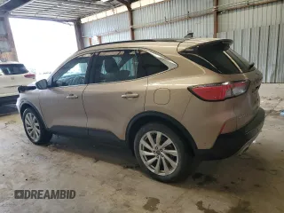 2021 Ford Escape Titanium with VIN 1FMCU9J90MUB15582, listed as a Copart auction lot 50982955 with 27,041 mi miles and Salvage Title. Bid and sale history available at carsss.com. Image 2.