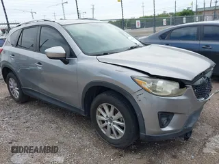 2015 Mazda CX-5 Sport z VIN JM3KE2BE7F0439338, wystawiony jako IAAI lot #42449460 z przebiegiem 201 572 mil mil oraz . Historia ofert i sprzedaży dostępna na DreamBid. Obrazek 1.