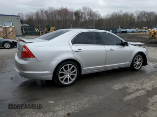 2012 Ford Fusion SE with VIN 3FAHP0HA1CR202982, listed as a Copart auction lot 52517915 with 189,475 mi miles and Salvage Title. Bid and sale history available at DreamBid. Image 3.