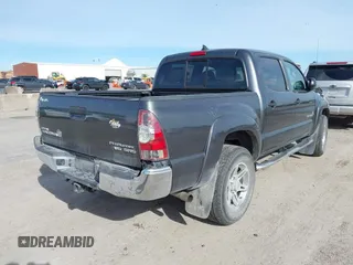 2014 Toyota Tacoma PreRunner with VIN 3TMJU4GN1EM156845, listed as a IAAI auction lot 40972570 with 65,138 mi miles. Bid and sale history available at carsss.com. Image 4.