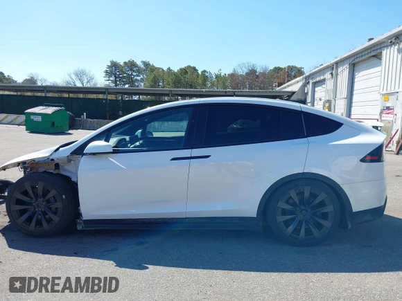 2022 Tesla Model X with VIN 7SAXCDE58NF342776, listed as a IAAI auction lot 42042369 with 70,301 mi miles and . Bid and sale history available at DreamBid. Image 14.