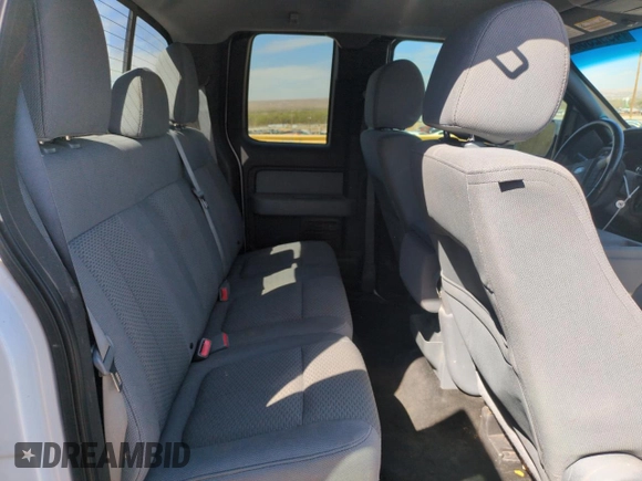 2012 Ford F-150 XL with VIN 1FTFX1ETXCFC98234, listed as a Copart auction lot 49923535 with 150,106 mi miles and Salvage title. Bid and sale history available at DreamBid. Image 10.