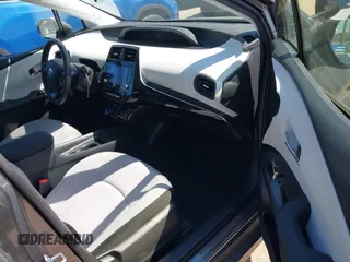 2022 Toyota Prius L Eco with VIN JTDKAMFU0N3173997, listed as a IAAI auction lot 42182489 with 41,220 mi miles and . Bid and sale history available at DreamBid. Image 5.