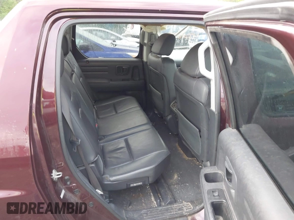 2010 Honda Ridgeline RTL with VIN 5FPYK1F57AB005602, listed as a IAAI auction lot 42208633 with 106,777 mi miles and . Bid and sale history available at DreamBid. Image 8.