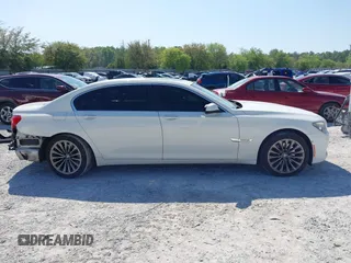2012 BMW 7 Series 740Li with VIN WBAKB4C53CC576991, listed as a IAAI auction lot 41985643 with 107,416 mi miles and . Bid and sale history available at DreamBid. Image 14.