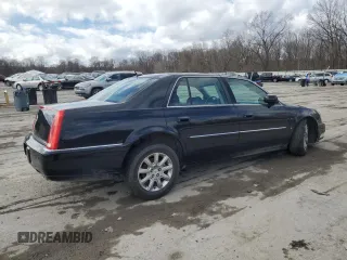 2008 Cadillac DTS 1SD z VIN 1G6KD57Y68U203116, wystawiony jako Copart lot #50050045 z przebiegiem 81 777 mil mil oraz Szkoda całkowita • Salvage title. Historia ofert i sprzedaży dostępna na DreamBid. Obrazek 3.