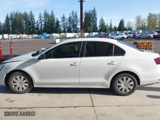2016 Volkswagen Jetta Sedan 1.4T S with VIN 3VW267AJXGM215994, listed as a IAAI auction lot 41993650 with 130,988 mi miles. Bid and sale history available at carsss.com. Image 14.
