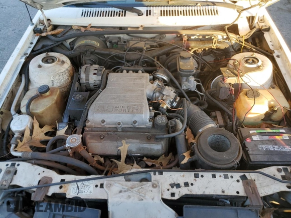 1988 Chevrolet Cavalier with VIN 1G1JF31WXJ7214292, listed as a Copart auction lot 87275184 with Not Provided miles and Salvage Title. Bid and sale history available at DreamBid. Image 11.