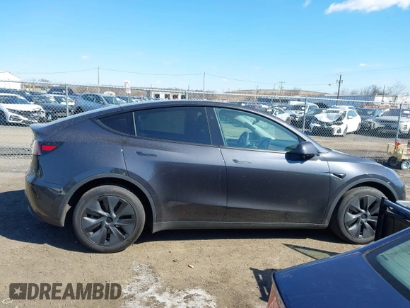 2024 Tesla Model Y Long Range with VIN 7SAYGDEE4RF149457, listed as a IAAI auction lot 41700922 with Not Provided miles. Bid and sale history available at carsss.com. Image 13.