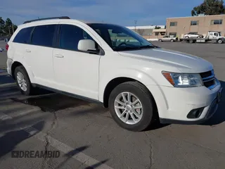 2015 Dodge Journey SXT with VIN 3C4PDCBG8FT673824, listed as a IAAI auction lot 41603661 with 169,939 mi miles and . Bid and sale history available at DreamBid. Image 1.