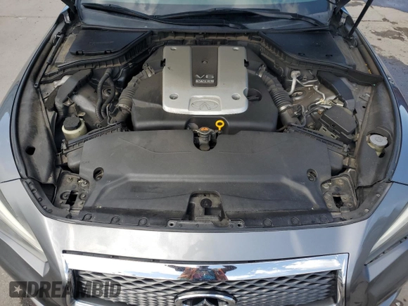2015 Infiniti Q50 Premium z VIN JN1BV7AR2FM395478, wystawiony jako Copart lot #62843995 z przebiegiem 137 945 mil mil oraz Szkoda całkowita • Salvage title. Historia ofert i sprzedaży dostępna na DreamBid. Obrazek 11.
