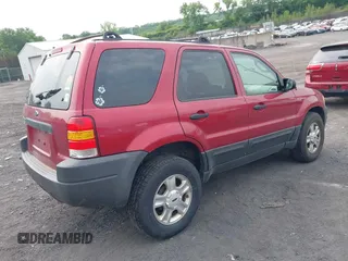 2004 Ford Escape XLT with VIN 1FMYU93154DA14180, listed as a IAAI auction lot 42430706 with 266,213 mi miles and . Bid and sale history available at DreamBid. Image 4.