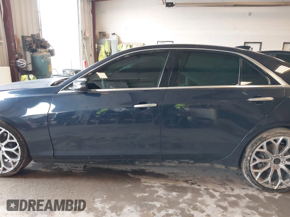 2015 Cadillac CTS AWD z VIN 1G6AW5SXXF0136481, wystawiony jako IAAI lot #42173024 z przebiegiem 128 984 mil mil oraz . Historia ofert i sprzedaży dostępna na DreamBid. Obrazek 15.