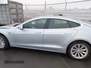 2016 Tesla Model S 70 with VIN 5YJSA1E17GF156514, listed as a IAAI auction lot 41869006 with 17,704 mi miles and . Bid and sale history available at DreamBid. Image 14.