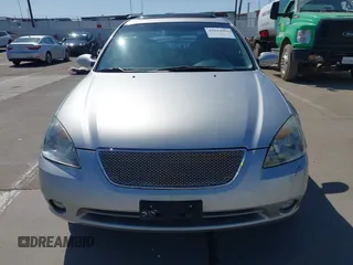 2002 Nissan Altima SE with VIN 1N4BL11E72C169164, listed as a IAAI auction lot 41992002 with 100,211 mi miles. Bid and sale history available at carsss.com. Image 12.