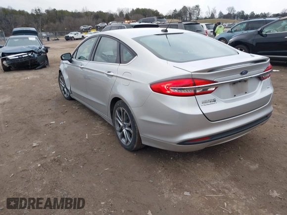 2017 Ford Fusion SE z VIN 3FA6P0H78HR174956, wystawiony jako IAAI lot #41258610 z przebiegiem 70 180 mil mil oraz . Historia ofert i sprzedaży dostępna na DreamBid. Obrazek 3.