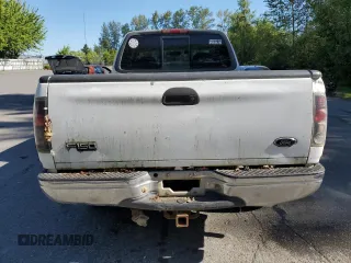 1998 Ford F-150 z VIN 1FTZX18W2WNC09396, wystawiony jako Copart lot #60355505 z przebiegiem 221 565 mil mil oraz Czysty tytuł • Clean title. Historia ofert i sprzedaży dostępna na DreamBid. Obrazek 6.