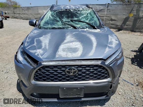 2022 Toyota Corolla Cross XLE with VIN 7MUEAAAG3NV012240, listed as a Copart auction lot 54125225 with 16,204 mi miles and Salvage title. Bid and sale history available at DreamBid. Image 5.