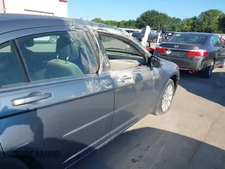 2010 Chrysler Sebring Limited with VIN 1C3CC5FD6AN190813, listed as a IAAI auction lot 42228345 with 113,512 mi miles and . Bid and sale history available at DreamBid. Image 13.