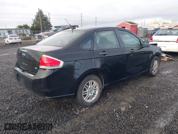 2010 Ford Focus SE with VIN 1FAHP3FN1AW108974, listed as a IAAI auction lot 41208950 with 146,536 mi miles. Bid and sale history available at carsss.com. Image 4.
