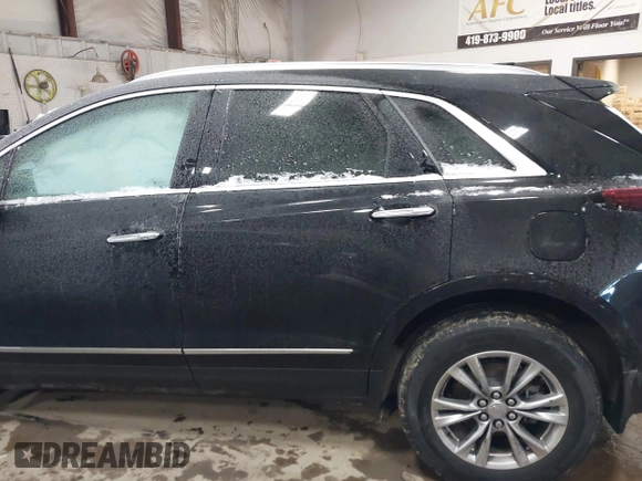 2021 Cadillac XT5 FWD Premium Luxury with VIN 1GYKNCRS3MZ198651, listed as a IAAI auction lot 41607734 with 49,275 mi miles. Bid and sale history available at carsss.com. Image 14.