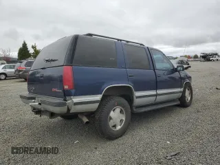1996 GMC Yukon with VIN 1GKEK13R3TJ747966, listed as a Copart auction lot 75346004 with 395,322 mi miles and Salvage Title. Bid and sale history available at carsss.com. Image 3.