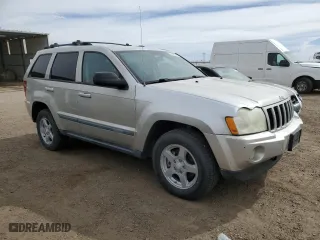 2007 Jeep Grand Cherokee Laredo with VIN 1J8HR48N27C632418, listed as a Copart auction lot 49002915 with 115,855 mi miles and Clean Title. Bid and sale history available at carsss.com. Image 4.
