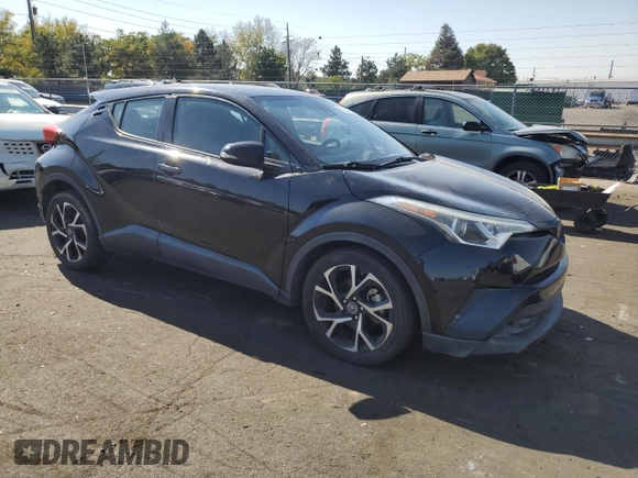 2018 Toyota C-HR XLE with VIN NMTKHMBX1JR013923, listed as a Copart auction lot 74324584 with 119,938 mi miles and Salvage Title. Bid and sale history available at DreamBid. Image 4.