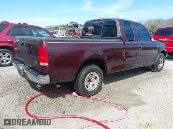 2000 Ford F-150 XL with VIN 1FTZX1725YNB34291, listed as a IAAI auction lot 41831745 with 207,119 mi miles. Bid and sale history available at carsss.com. Image 4.