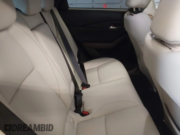 2023 Mazda CX-30 S Premium with VIN 3MVDMBDM5PM518612, listed as a IAAI auction lot 42219265 with 29,135 mi miles and . Bid and sale history available at DreamBid. Image 8.