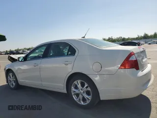 2012 Ford Fusion SE with VIN 3FAHP0HA5CR365828, listed as a Copart auction lot 61581295 with 142,207 mi miles and Salvage title. Bid and sale history available at DreamBid. Image 2.