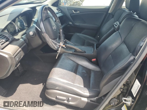 2010 Acura TSX with VIN JH4CU2F6XAC001583, listed as a Copart auction lot 61772095 with 219,817 mi miles and Salvage title. Bid and sale history available at DreamBid. Image 7.