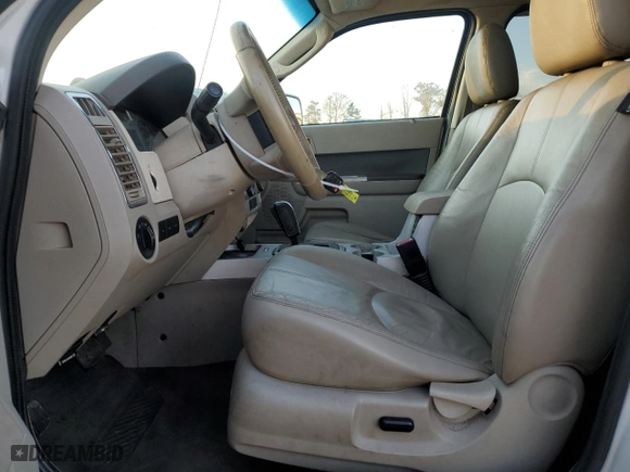 2009 Mercury Mariner Premier with VIN 4M2CU87789KJ14357, listed as a Copart auction lot 82326724 with 227,360 mi miles and Salvage Title. Bid and sale history available at carsss.com. Image 7.