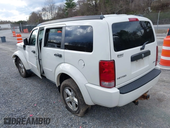 2007 Dodge Nitro SXT with VIN 1D8GU28K77W727391, listed as a IAAI auction lot 41869288 with 214,920 mi miles. Bid and sale history available at carsss.com. Image 3.