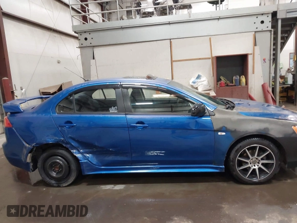 2009 Mitsubishi Lancer ES with VIN JA3AU26U29U036243, listed as a IAAI auction lot 41952044 with 181,650 mi miles. Bid and sale history available at carsss.com. Image 13.