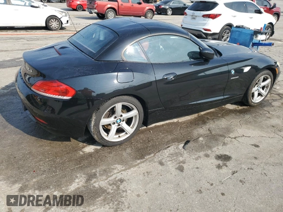 2009 BMW Z4 sDrive30i с VIN WBALM53589E161683, выставлен на аукционе Copart как лот 60557635 с пробегом 70 183 миль миль и Списание • Salvage title. История ставок и продаж доступна на DreamBid. Изображение 3.