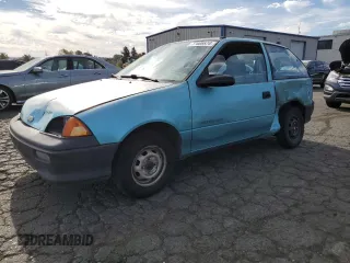 1992 Geo Metro z VIN 2C1MS2465N6782913, wystawiony jako Copart lot #77405574 z przebiegiem 77 080 mil mil oraz Szkody całkowita. Historia ofert i sprzedaży dostępna na DreamBid. Obrazek 1.