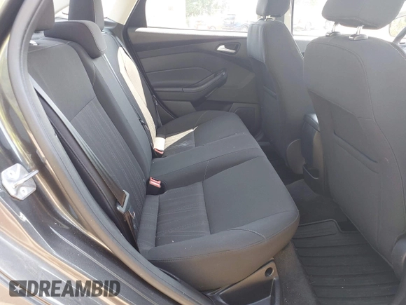 2015 Ford Focus SE with VIN 1FADP3F25FL300945, listed as a IAAI auction lot 42483699 with 76,992 mi miles and . Bid and sale history available at DreamBid. Image 8.