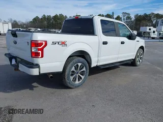 2019 Ford F-150 XL with VIN 1FTEW1E51KFC52807, listed as a IAAI auction lot 41383212 with 124,244 mi miles and . Bid and sale history available at DreamBid. Image 4.