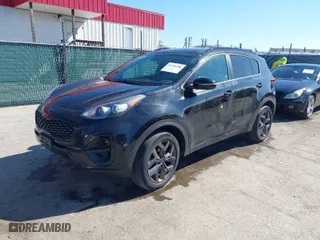 2021 Kia Sportage S with VIN KNDP6CACXM7867510, listed as a IAAI auction lot 41740288 with 64,198 mi miles. Bid and sale history available at carsss.com. Image 2.