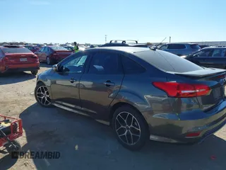 2016 Ford Focus SE with VIN 1FADP3F21GL262907, listed as a IAAI auction lot 41657582 with 62,789 mi miles. Bid and sale history available at carsss.com. Image 3.