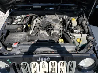 2014 Jeep Wrangler Sport with VIN 1C4AJWAG5EL192554, listed as a Copart auction lot 52501535 with 117,038 mi miles and Salvage Title. Bid and sale history available at carsss.com. Image 13.