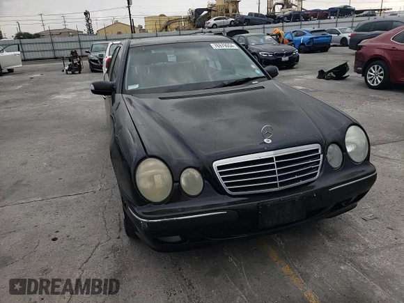 2002 Mercedes-Benz E-Class with VIN WDBJF65J42B486633, listed as a Copart auction lot 76979054 with 151,429 mi miles and Salvage Title. Bid and sale history available at carsss.com. Image 11.
