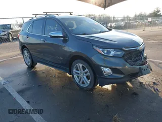 2018 Chevrolet Equinox Premier with VIN 2GNAXWEX7J6139051, listed as a IAAI auction lot 41216437 with 105,453 mi miles and . Bid and sale history available at carsss.com. Image 1.