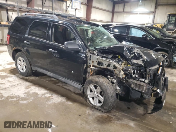2010 Ford Escape Hybrid with VIN 1FMCU4K39AKB81388, listed as a Copart auction lot 48422145 with 227,429 mi miles and Salvage title. Bid and sale history available at DreamBid. Image 4.