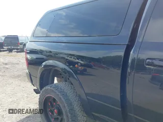 2015 Ram 2500 Laramie with VIN 3C6UR5FL0FG655552, listed as a IAAI auction lot 42456897 with 143,885 mi miles and . Bid and sale history available at DreamBid. Image 13.