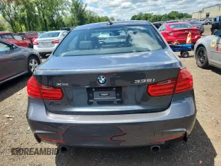 2014 BMW 3 Series 335i xDrive with VIN WBA3B9C58EJ466051, listed as a Copart auction lot 65060915 with Not provided miles and Salvage title. Bid and sale history available at DreamBid. Image 6.