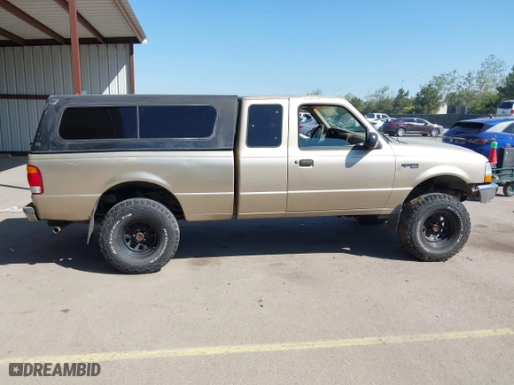 1999 Ford Ranger XL with VIN 1FTYR14X9XTA59675, listed as a IAAI auction lot 41861165 with 208,928 mi miles. Bid and sale history available at carsss.com. Image 13.