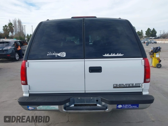 1997 Chevrolet Suburban with VIN 3GNFK16R9VG187426, listed as a IAAI auction lot 41678063 with 131,387 mi miles. Bid and sale history available at carsss.com. Image 16.